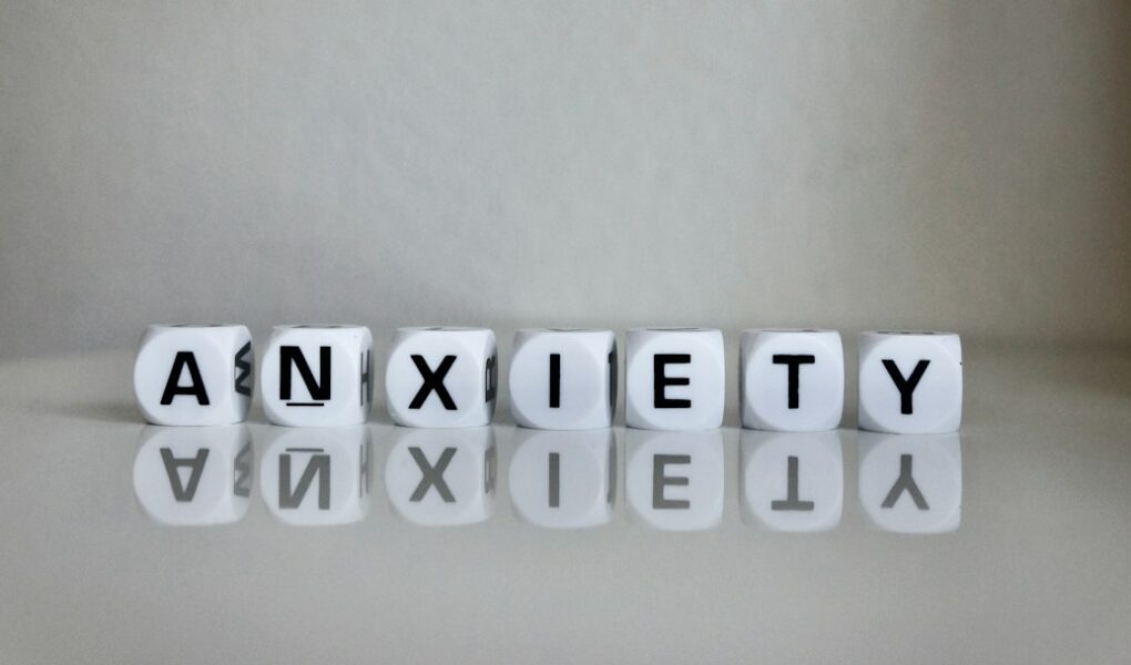Calm breathing kit, notebook, and tea arranged for anxiety management techniques