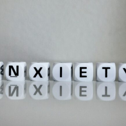 Calm breathing kit, notebook, and tea arranged for anxiety management techniques