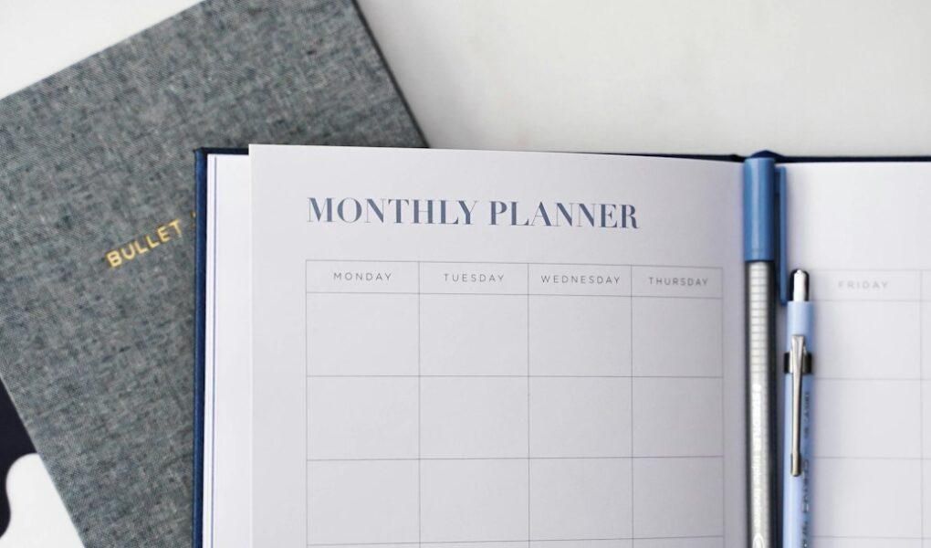 Cover image for daily self-care planner with icons for sleep, water, notes, and calm colors