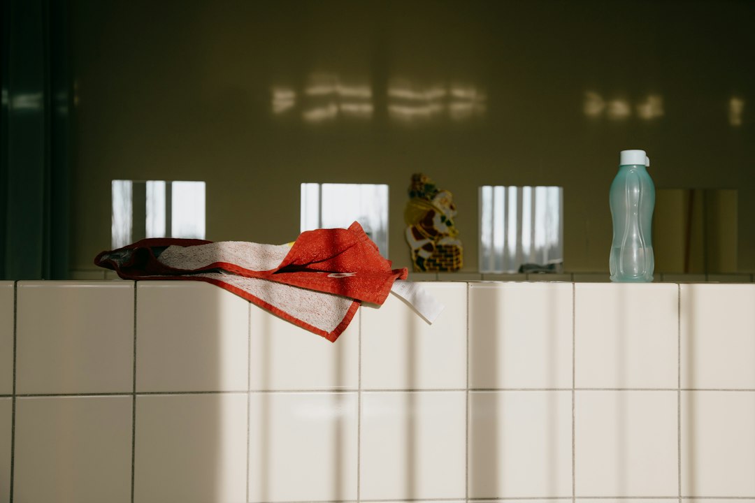Cover illustration of a gentle skincare routine with cleanser, hydrator, moisturizer, and sunscreen arranged on a tidy vanity